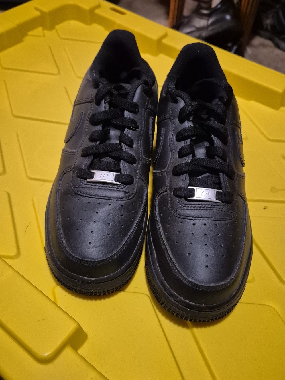 Nike Kids Black Leather Sneakers with Lace-Up Closure